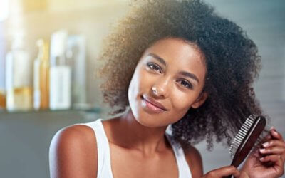 Cheveux afro : Découvrez les indispensables soins protecteurs de chaleur  